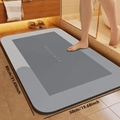 Absorbent bathroom mat